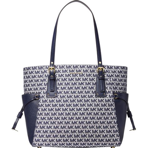 michael kors east west tote bag|Michael Kors voyager signature tote.